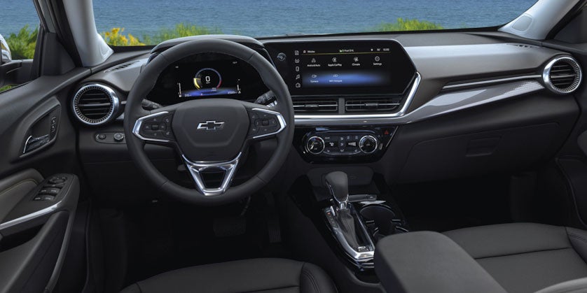 Interior view of front seats and dashboard in a 2025 Chevrolet Malibu